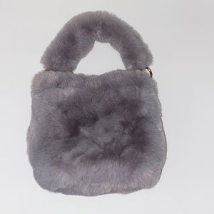 Super soft brand-new faux fur handbag